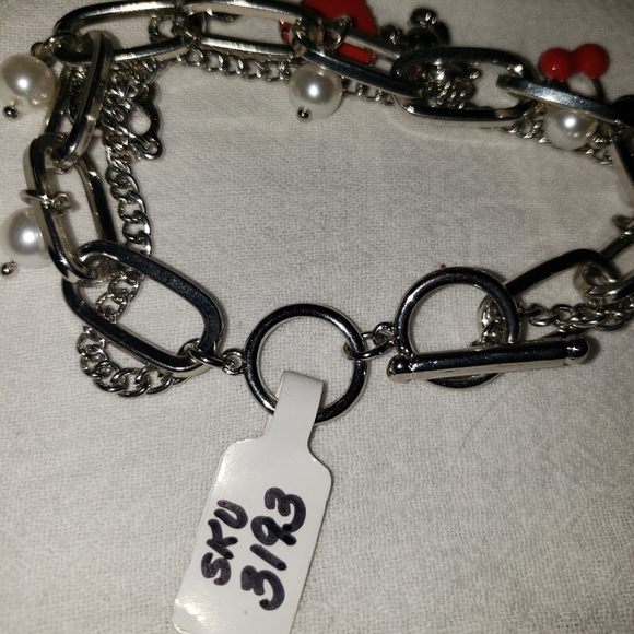 Super Cute Girlie Charm Bracelet Silvertone from our local boutique - Picture 5 of 7